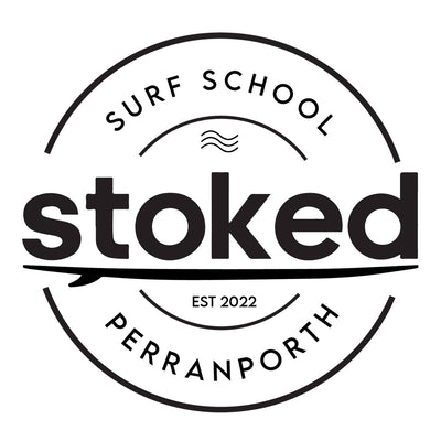 Logo of Stoked Surf School Perranporth with text and wave design.